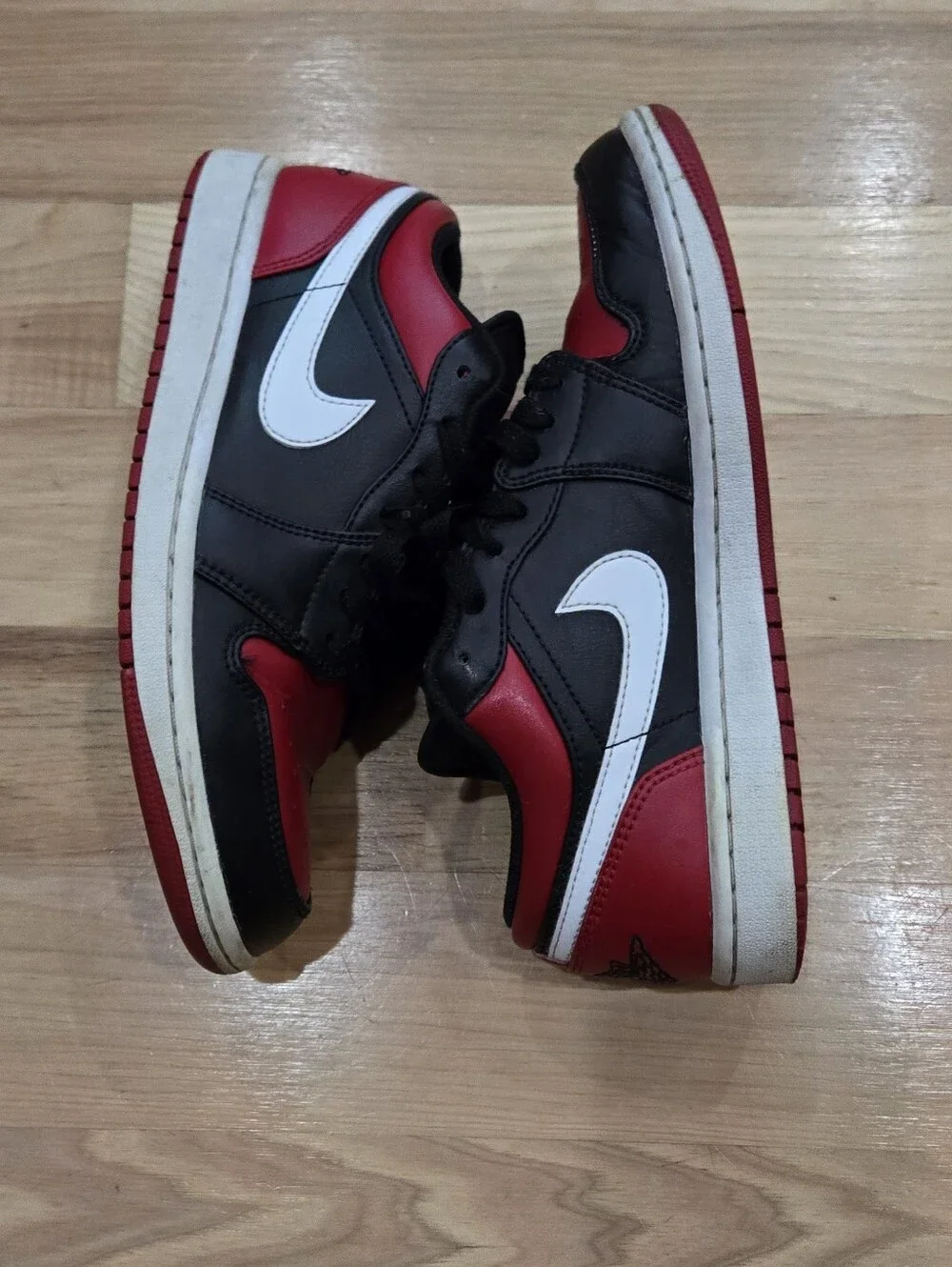 Nike Jordan 1 Low Black Red White Sneakers with White Swoosh